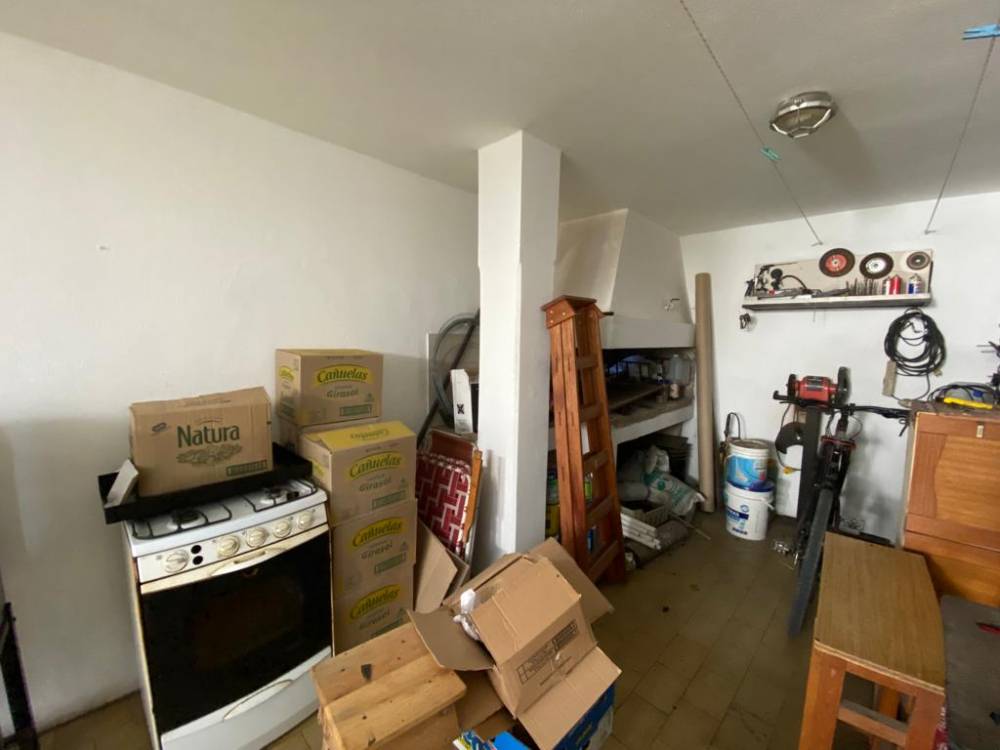 CASA UBICADA SOBRE CALLE ITUZAINGO 