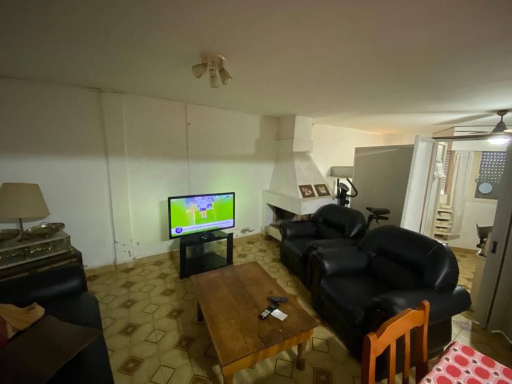 CASA UBICADA SOBRE CALLE ITUZAINGO 