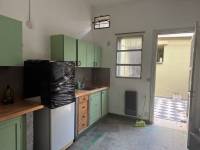 En pleno centro: cómoda casa con gran terreno y patio