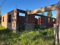 Terreno con construcción a terminar, interesante como inversión 