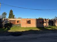 Terreno con construcción a terminar, interesante como inversión 