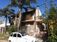 Casa con Amplio Parque y Terraza en Barrio Vinelli